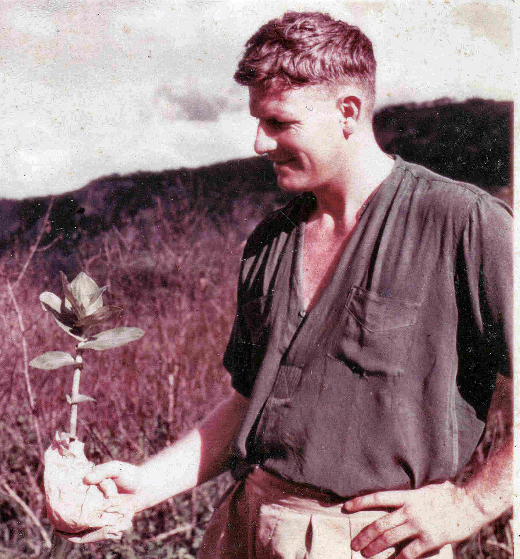 John Ball with an orchid plant